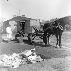 Horse-drawn cart with goods